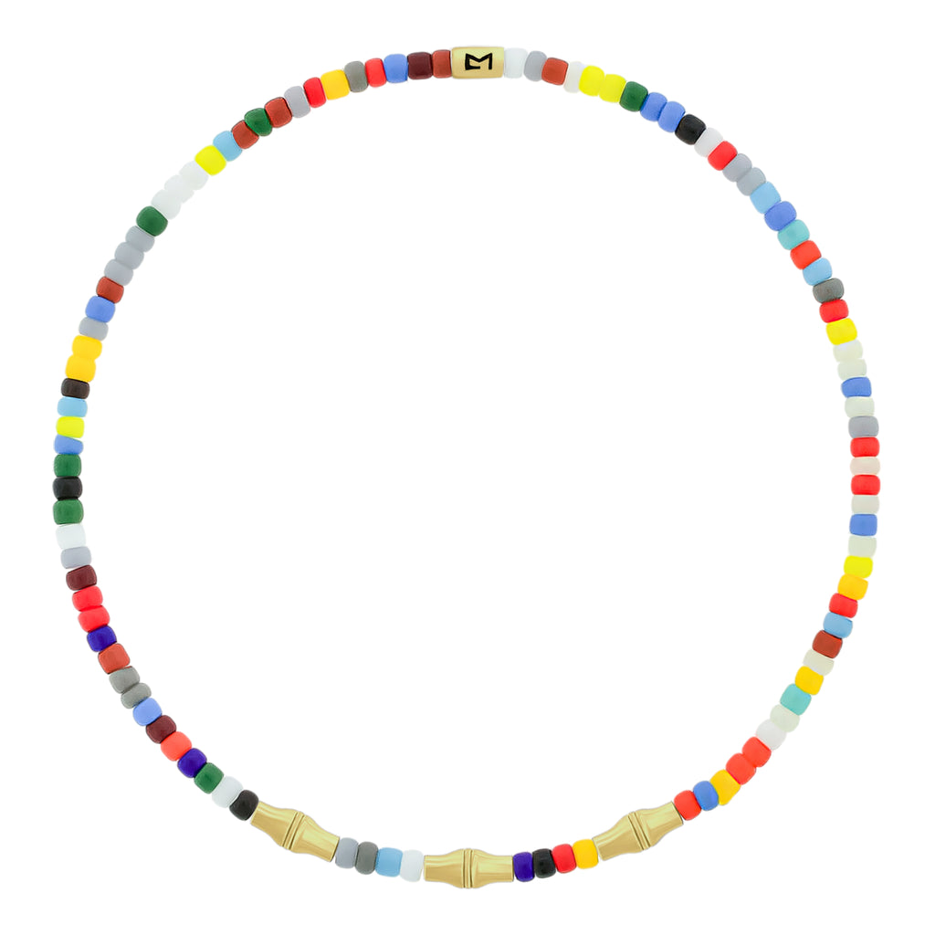 LUIS MORAIS glass beaded bracelet with three 14k yellow gold mini Canister Bamboo tubes and gold logo spacer.&nbsp;Bamboo symbolizes strength, resilience, and the ability to grow through adversity.
