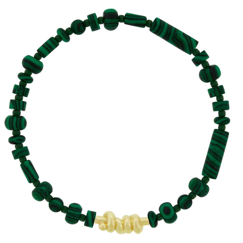LUIS MORAIS 14k yellow gold Entangled Knot on a gemstone and glass beaded bracelet. This bracelet features an entangled knot, symbolizing the interconnectedness of life, love, and destiny. The design represents how our paths, though complex, are ultimately bound together in a shared journey. A meaningful reminder of the strength found in togetherness the bonds that hold us together.