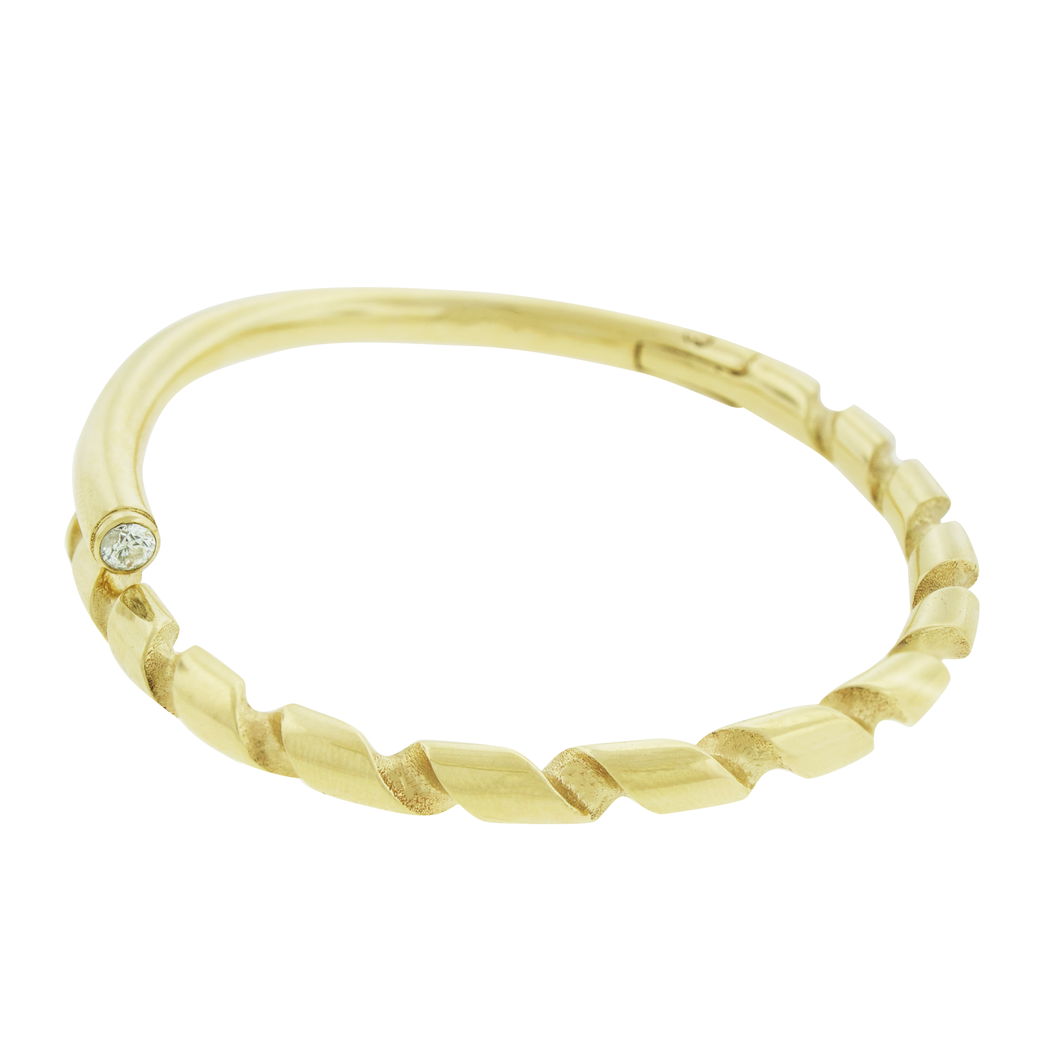 LUIS MORAIS 14k yellow gold drill bit bracelet with a white diamond accent on the end tip. The drill bit design is symbolic of digging deeper into oneself and life’s challenges. It represents resilience and the pursuit of discovery, encouraging the wearer to push through obstacles and uncover hidden truths.