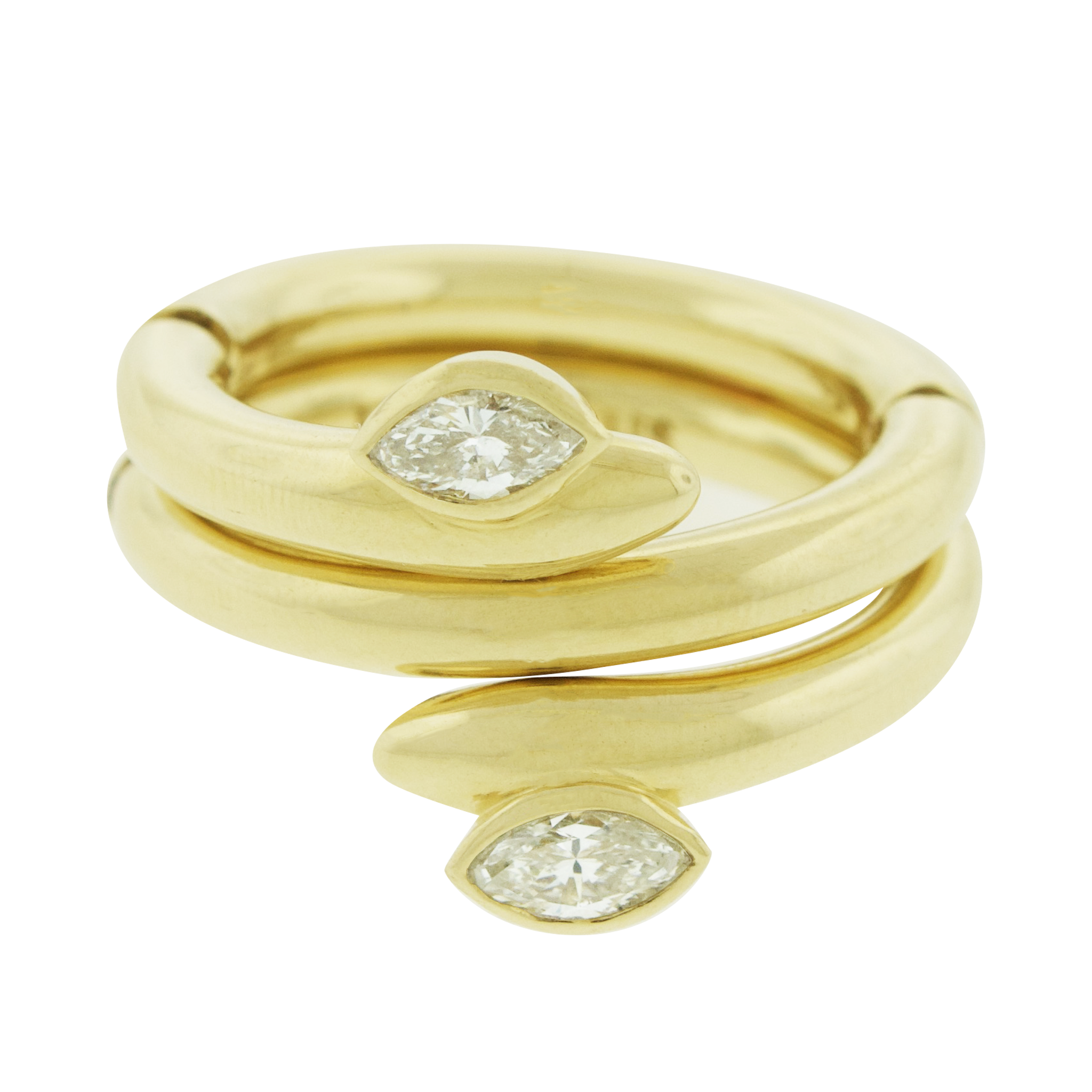 Sleek and sculptural, this Serpentine Ring is crafted in solid 14k yellow gold and features two marquise-cut white diamonds. The flexible design can be worn across up to three fingers. A bold, modular piece that merges clean lines with edge.