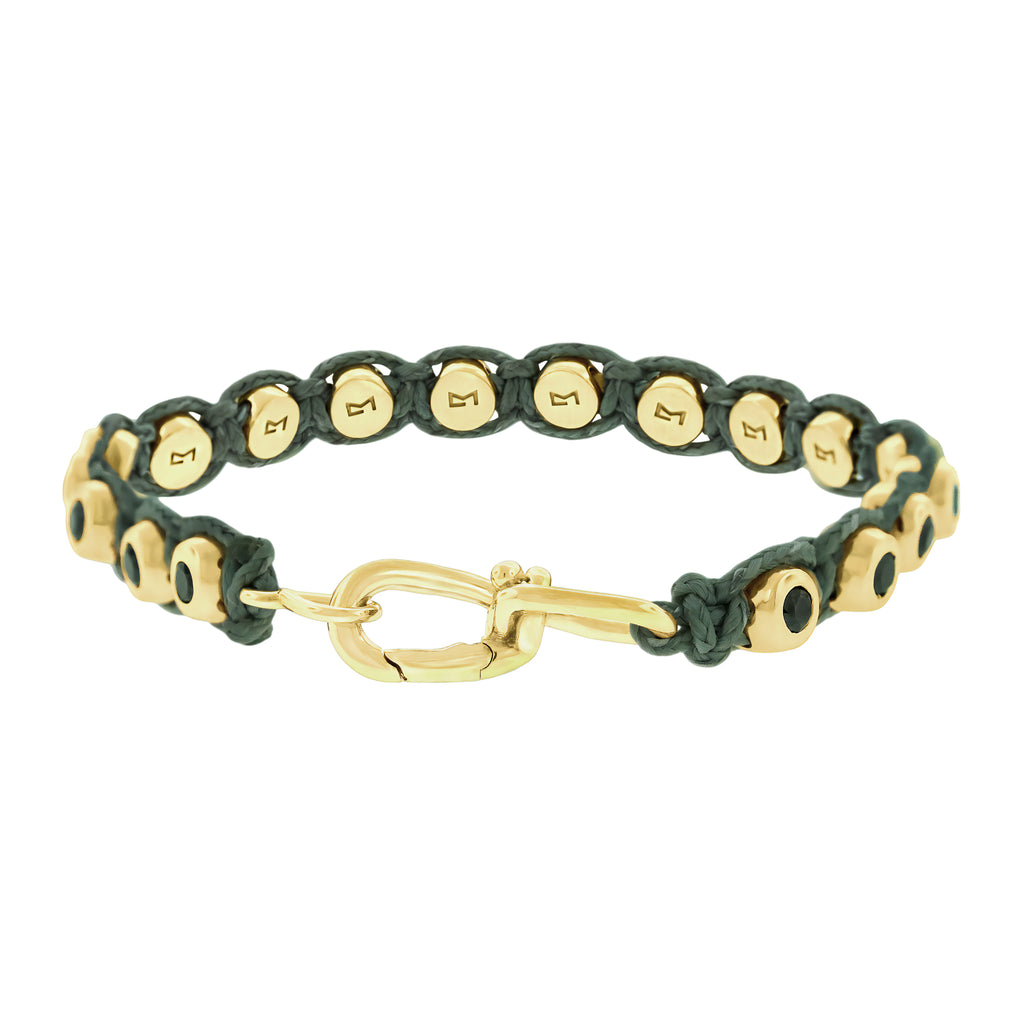 LUIS MORAIS 14k yellow gold wire clasp with black diamond domes on a macrame cord bracelet.&nbsp;
