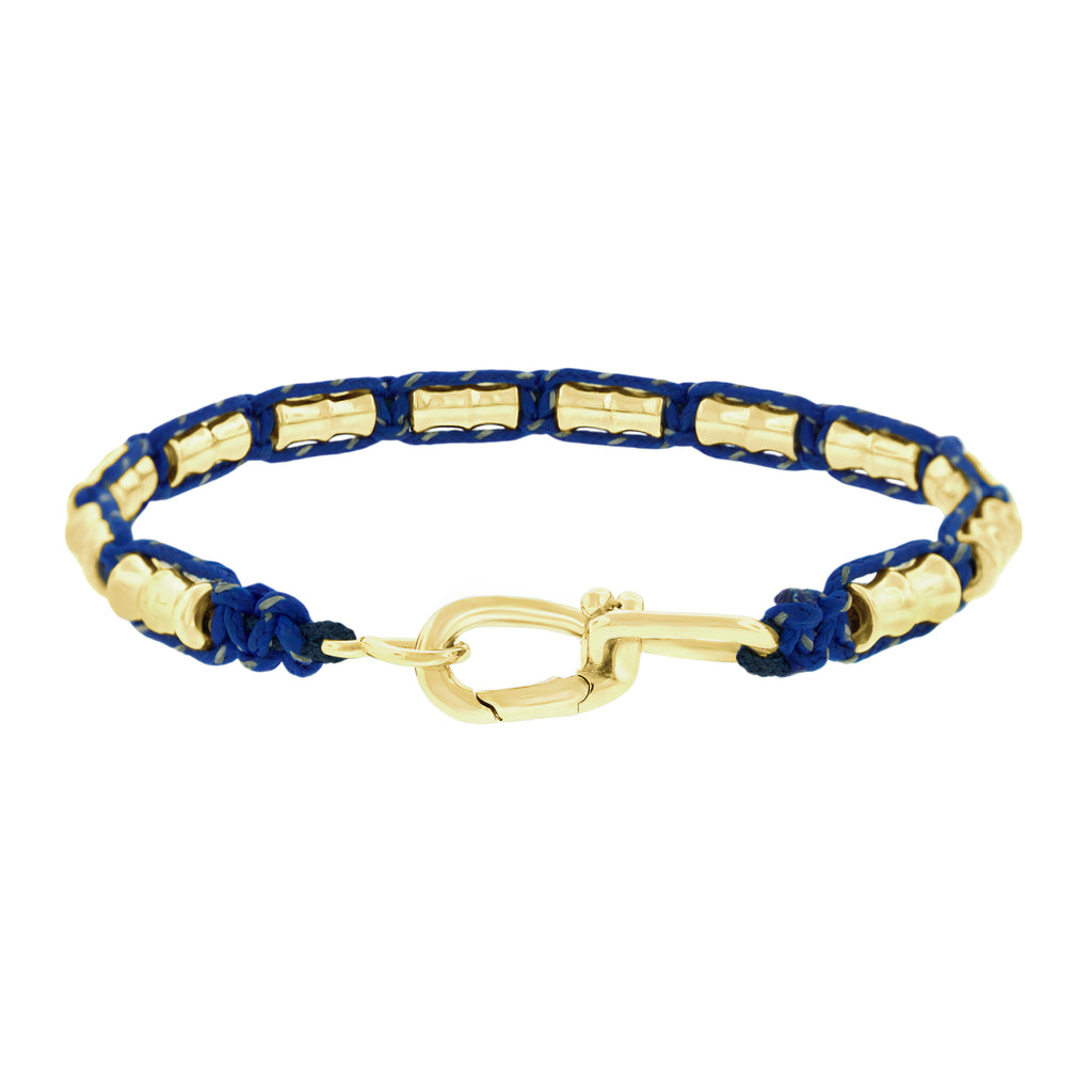LUIS MORAIS 14k yellow gold bamboo tubes on a macrame cord bracelet. Wire clasp closure.&nbsp;