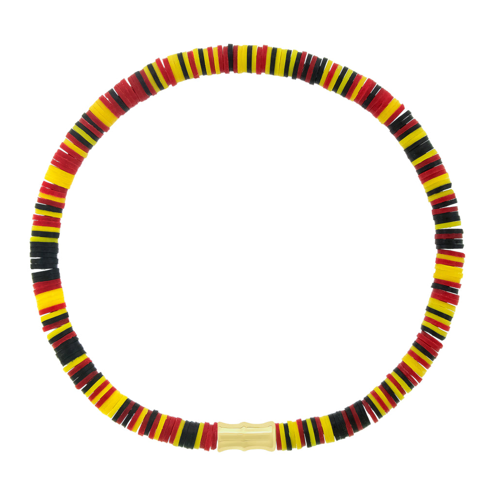 LUIS MORAIS 14k yellow gold bamboo tube on a vinyl beaded bracelet. Elastic cord.