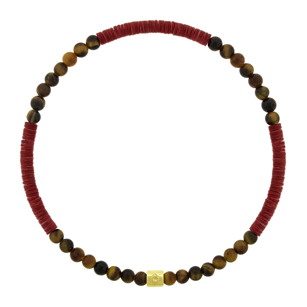 LUIS MORAIS 14K yellow gold short roll with a recessed evil eye symbol on a gemstone and vinyl beaded bracelet.