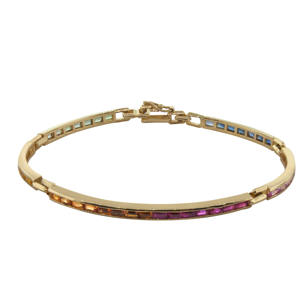 LUIS MORAIS 14k yellow gold long link ID bracelet featuring rainbow sapphire baguettes.  Approximately 4-5 carats of stones.