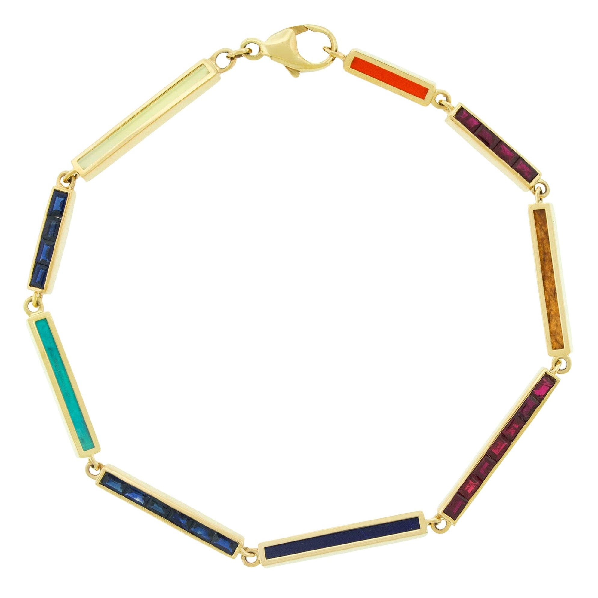 A gold link bracelet featuring multiple rectangular inlay segments in vibrant colors including blue, teal, orange, brown, and purple, displayed on a clean white background.
