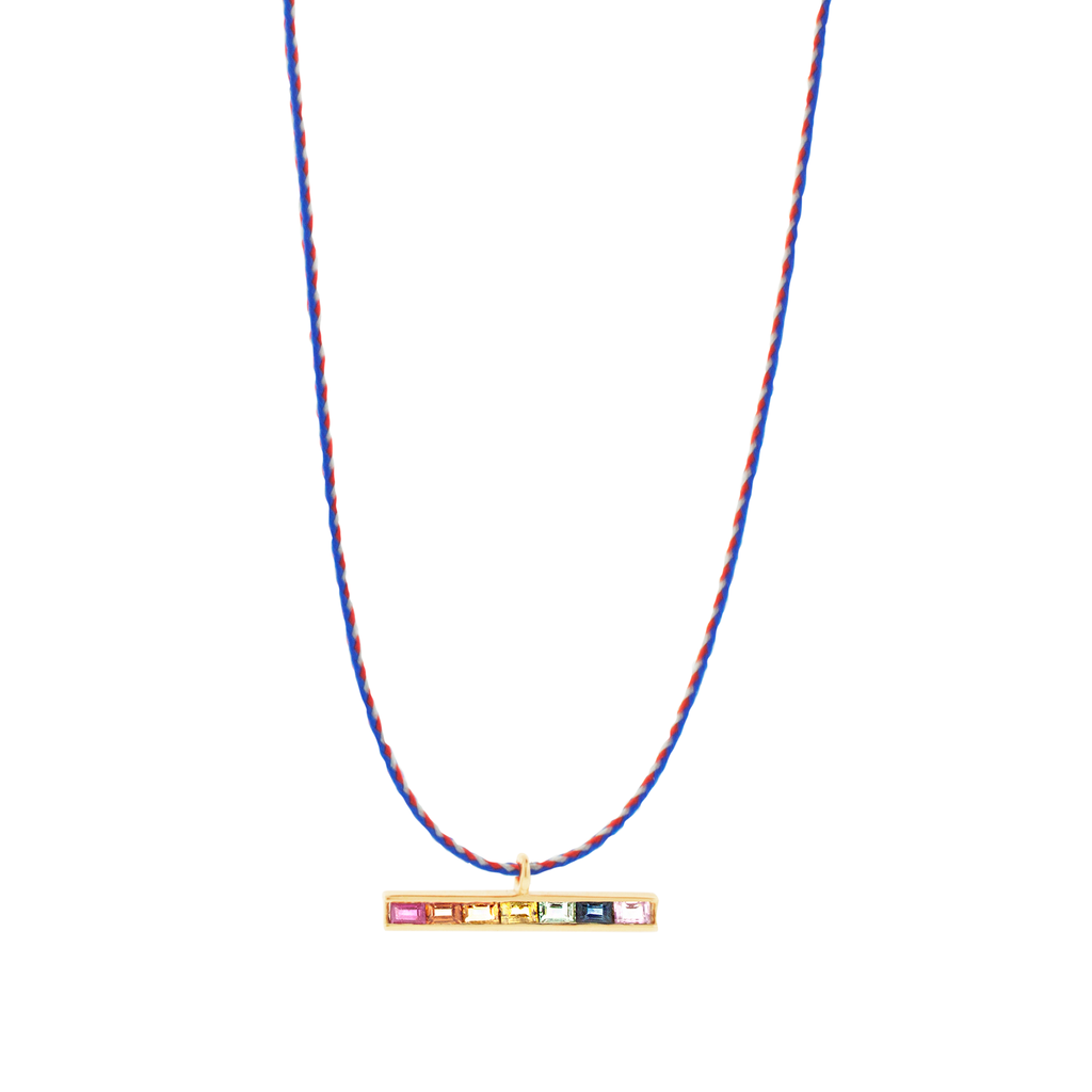 LUIS MORAIS 14k yellow gold medium link ID bar with rainbow sapphire baguettes on a cord necklace. Lobster clasp closure.   Length: 20 inches