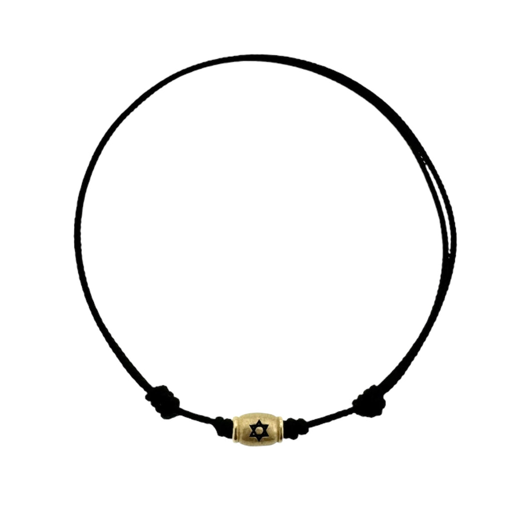 LUS MORAIS 14K Yellow gold barrel with Star of David symbol on a cord bracelet.