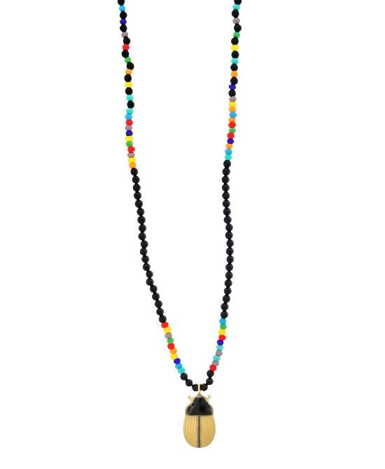 LUIS MORAIS 14k yellow gold Scarab pendant with black enamel on a beaded necklace. Features gold logo spacer.