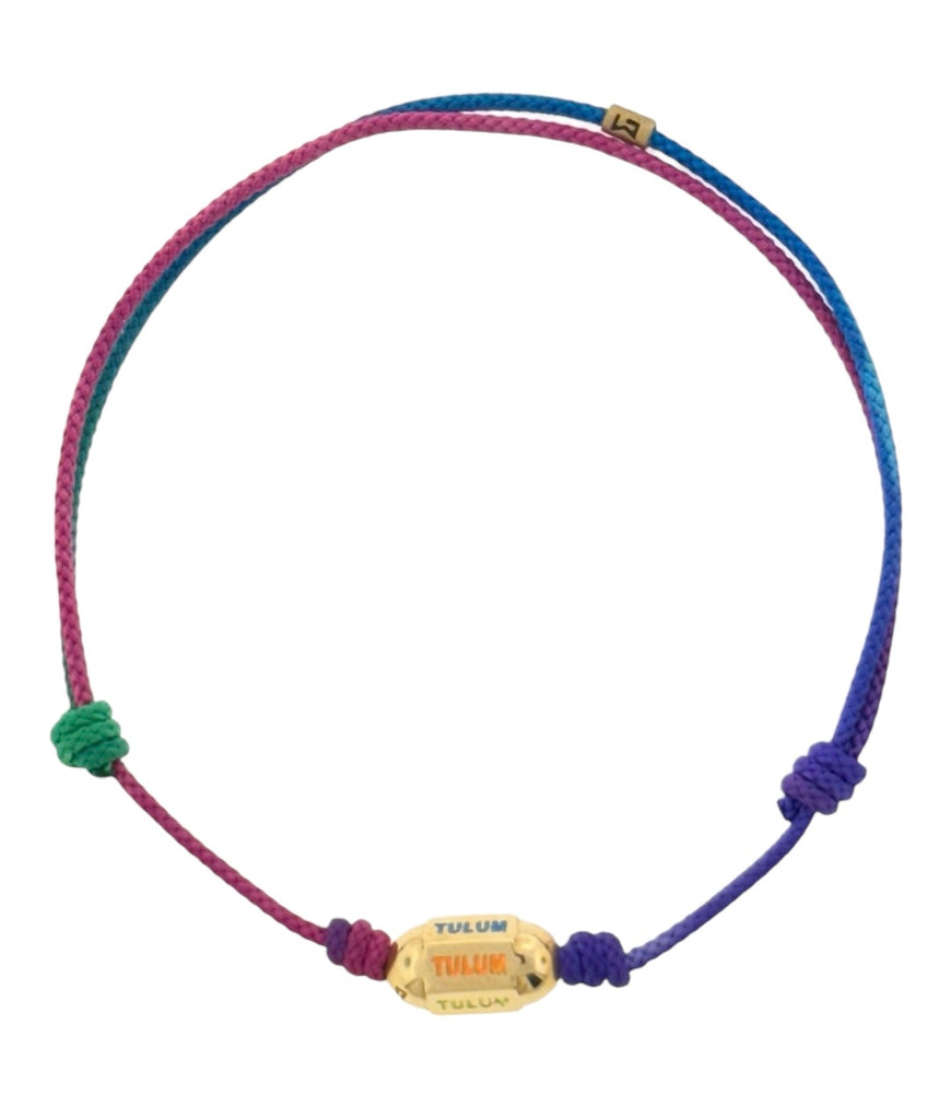 LUS MORAIS 14K Yellow TULUM hexagon bolt bead with multicolor enamel on a rainbow cord bracelet.