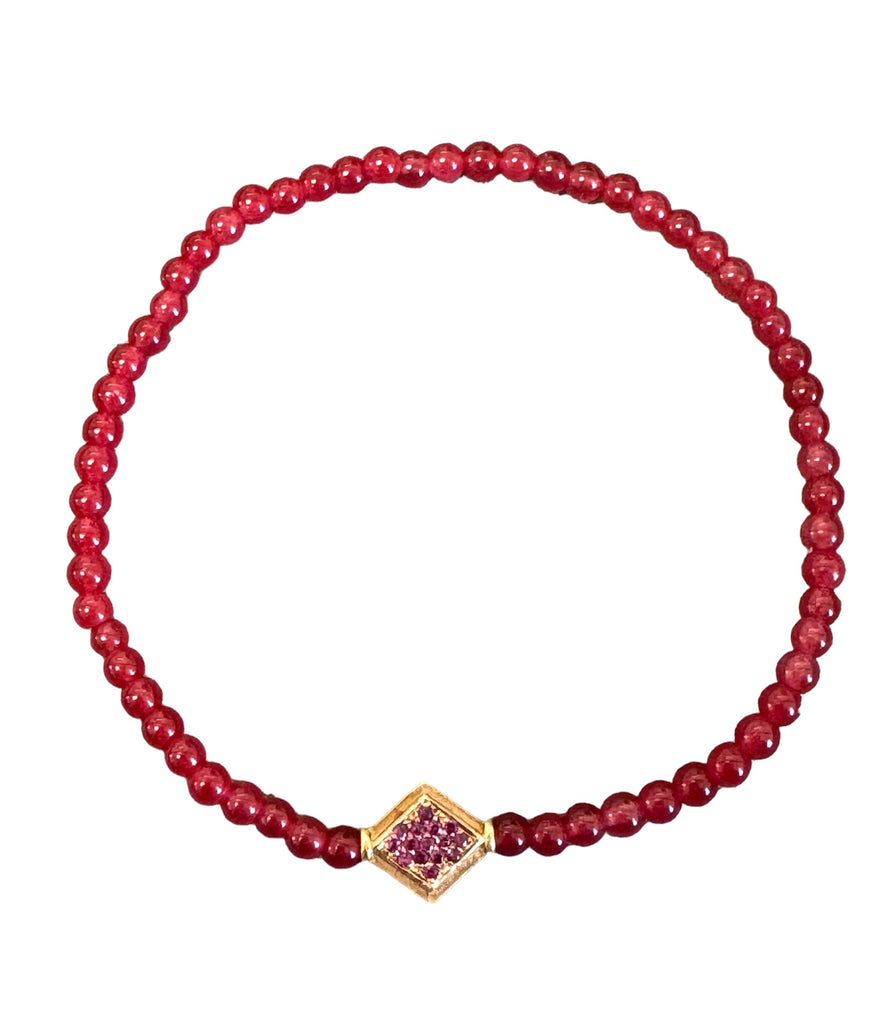 LUIS MORAIS 14k yellow gold lozenge with rubies on both sides on a Garnet beaded bracelet.