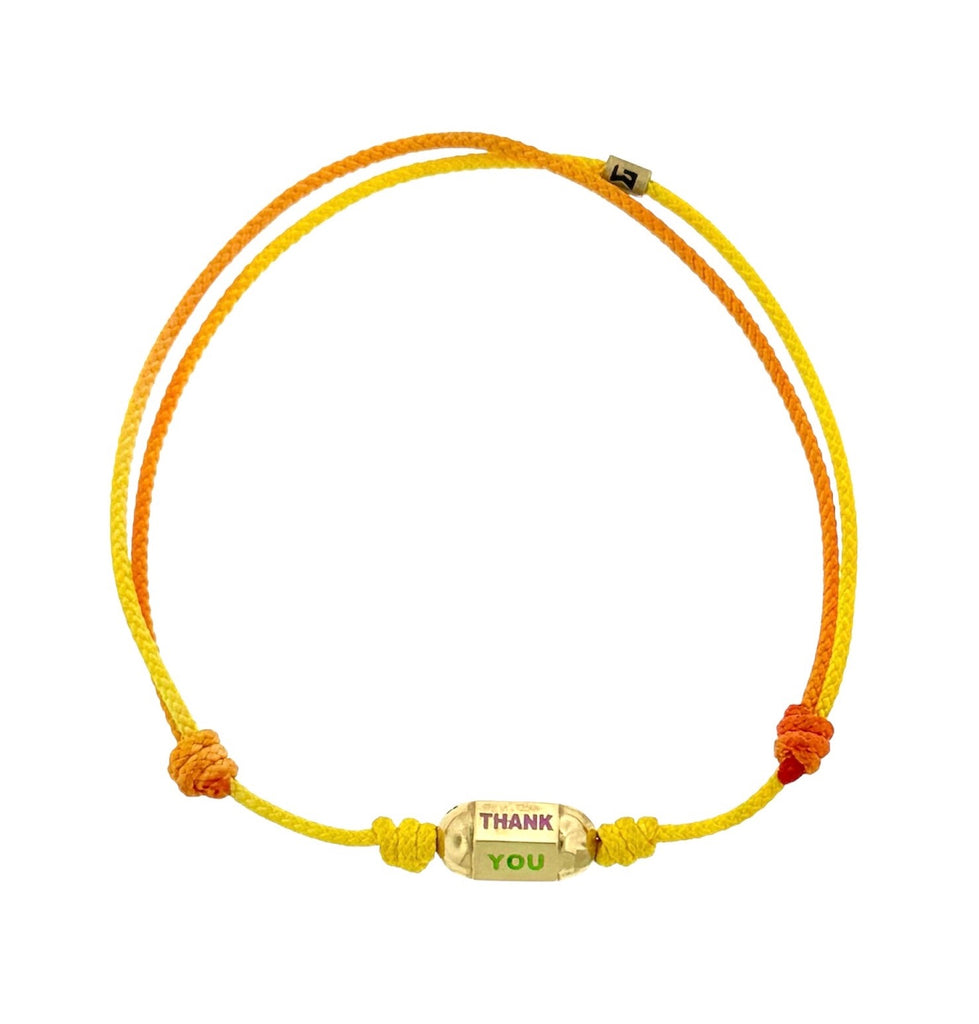 MERCI Perle hexagonale émaillée sur un bracelet cordon