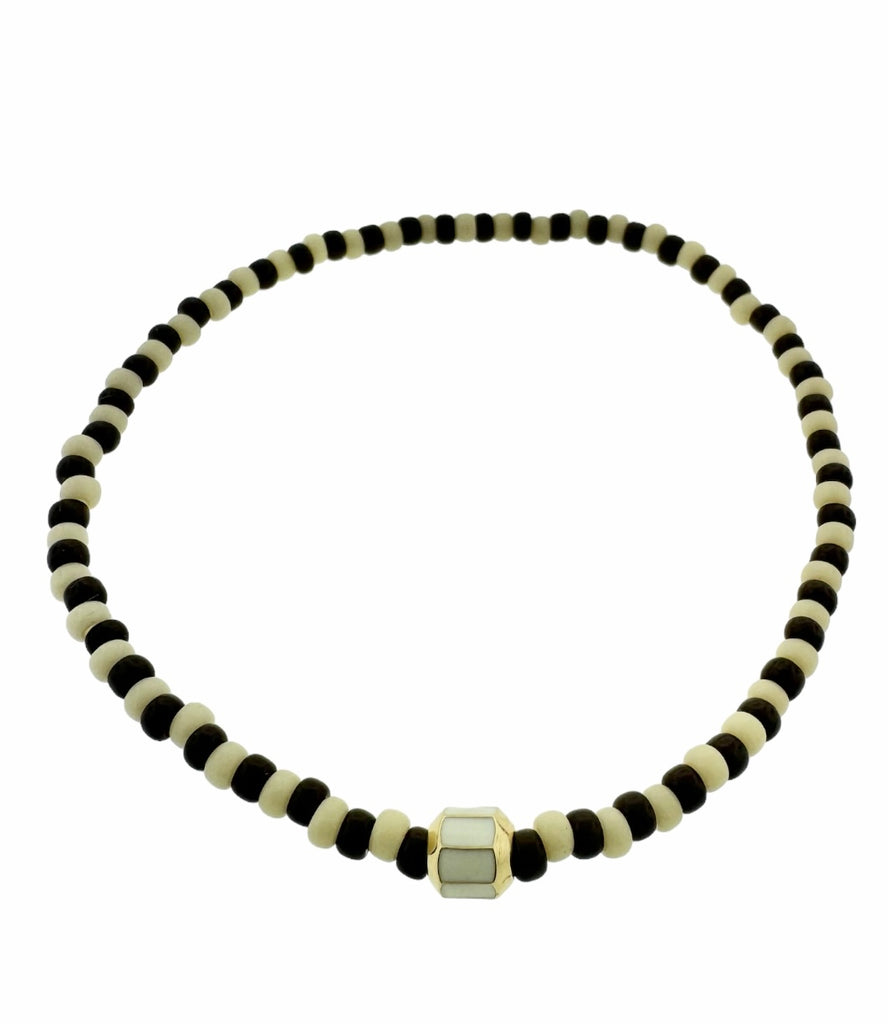 LUIS MORAIS 14K yellow gold small enameled octagon bead on a glass beaded bracelet.