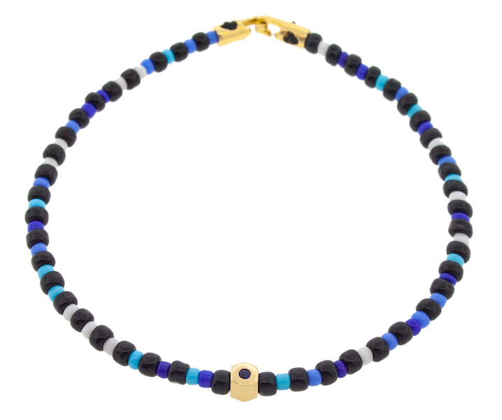 LUIS MORIAS 14K yellow gold tetra bead with a blue sapphire on a glass beaded bracelet with hook clasp closure.