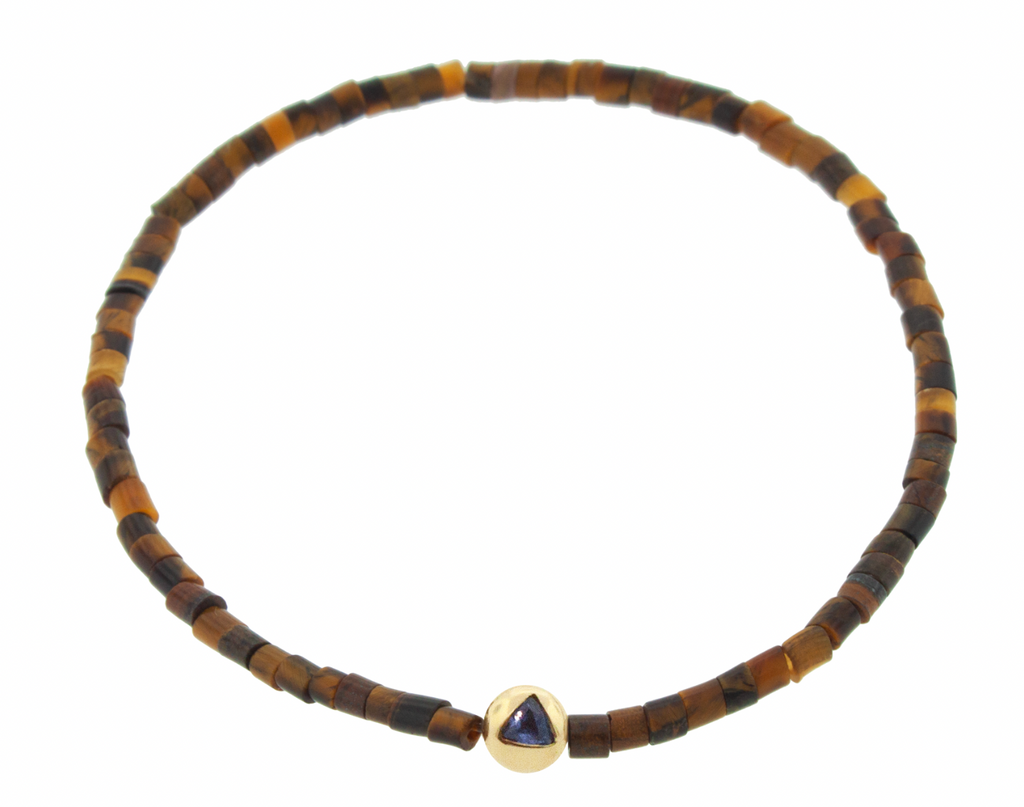 LUIS MORAIS 14K yellow gold medium ball with a blue sapphire trillion on a Tiger's Eye gemstone tube beaded bracelet.