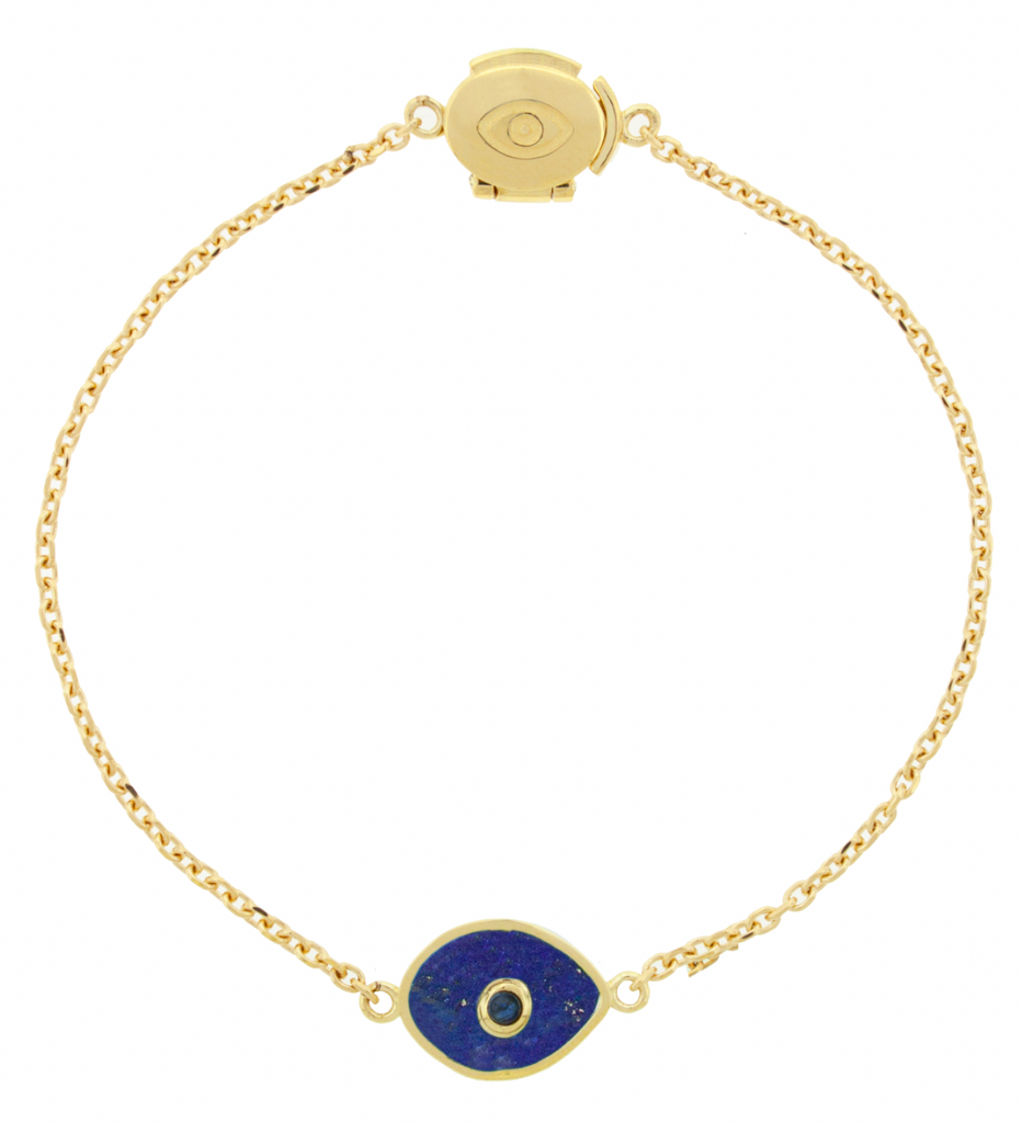 LUIS MORAIS 14k yellow gold cable chain bracelet with a gold framed gemstone eye and a sapphire cabochon center. Features an engraved eye clamshell clasp closure. The evil eye is a symbol of protection, believed to ward off negative energy and bring good fortune.
