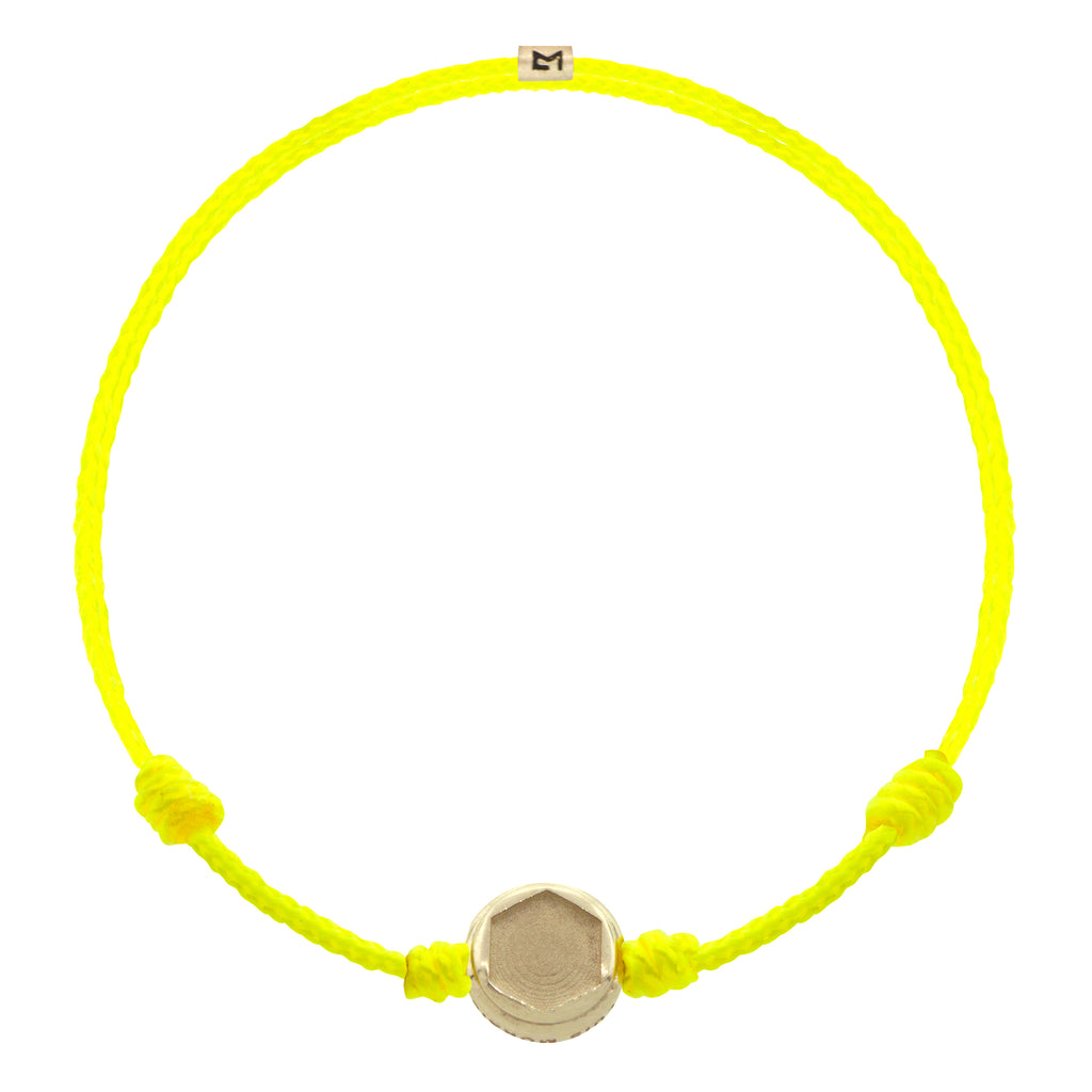 LUIS MORAIS 14K yellow gold small star hex head disk and logo spacer on an adjustable cord bracelet.  