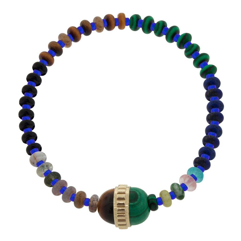 14K yellow gold ribbed vertical collar with tiger's eye and malachite cabochons on a beaded bracelet.