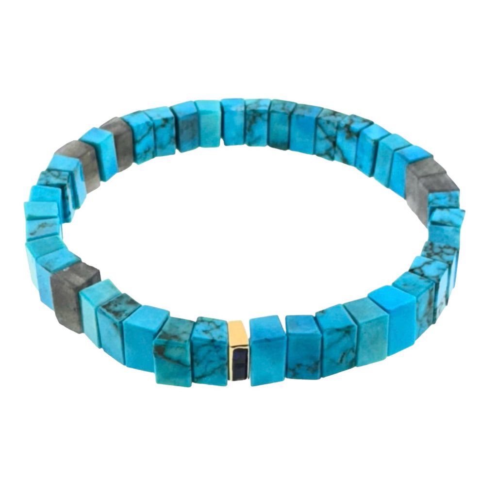 LUIS MORAIS 14k yellow gold bead with blue sapphires on a Turquoise and Labradorite beaded bracelet.