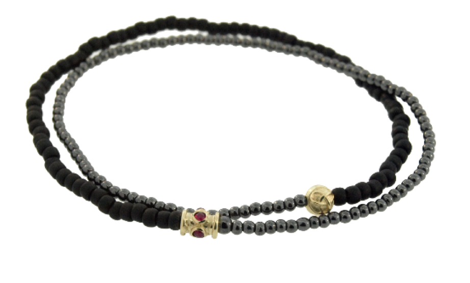 LUIS MORAIS double-wrap beaded bracelet features a 14k yellow gold barrel with rubies and a round Torus knot gold bead.