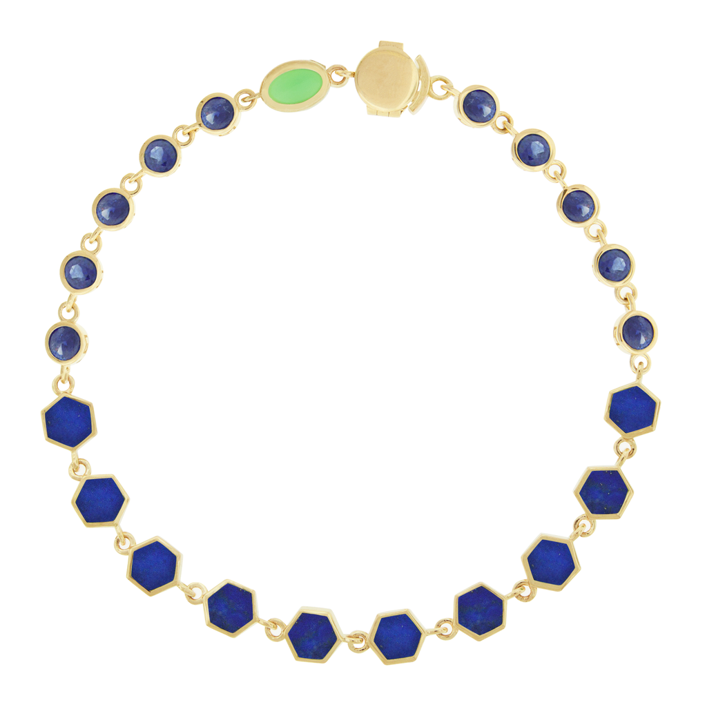 LUIS MORAIS 14k yellow gold bracelet featuring carved hexagon gemstones and round Sapphires. Our unique clamshell clasp closure provides added security with its sleek design.