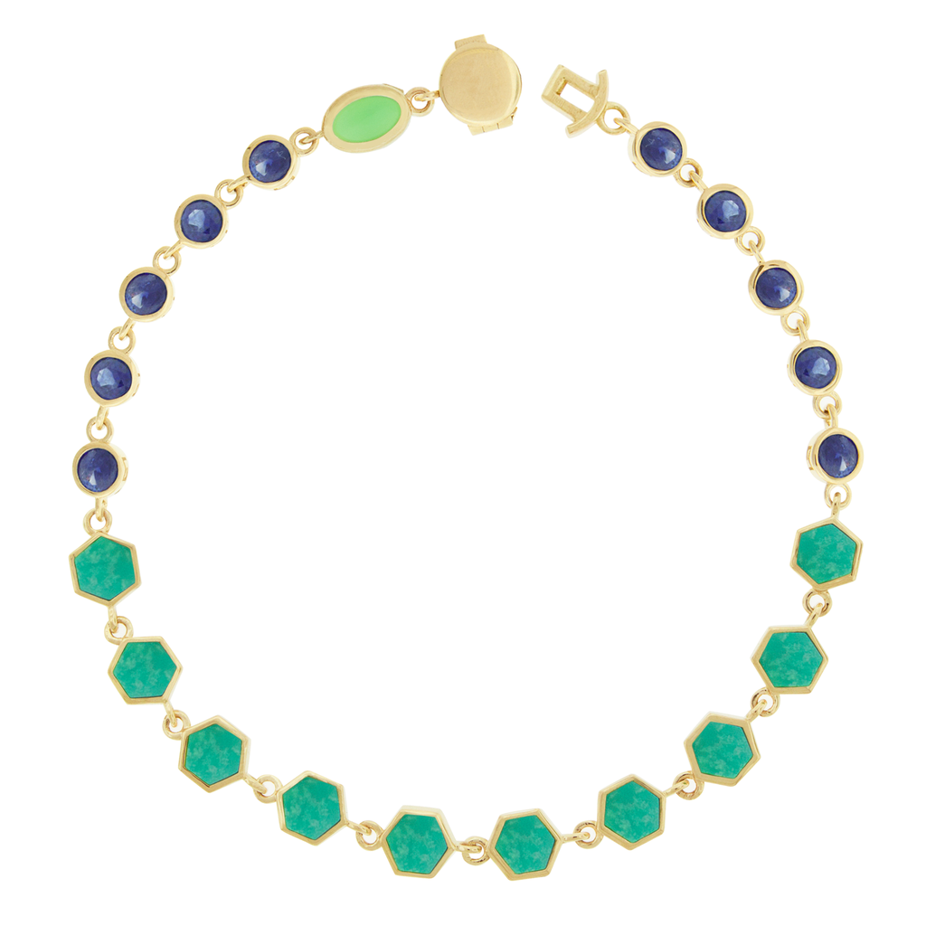 LUIS MORAIS 14k yellow gold bracelet featuring carved hexagon gemstones and round Sapphires. Our unique clamshell clasp closure provides added security with its sleek design.