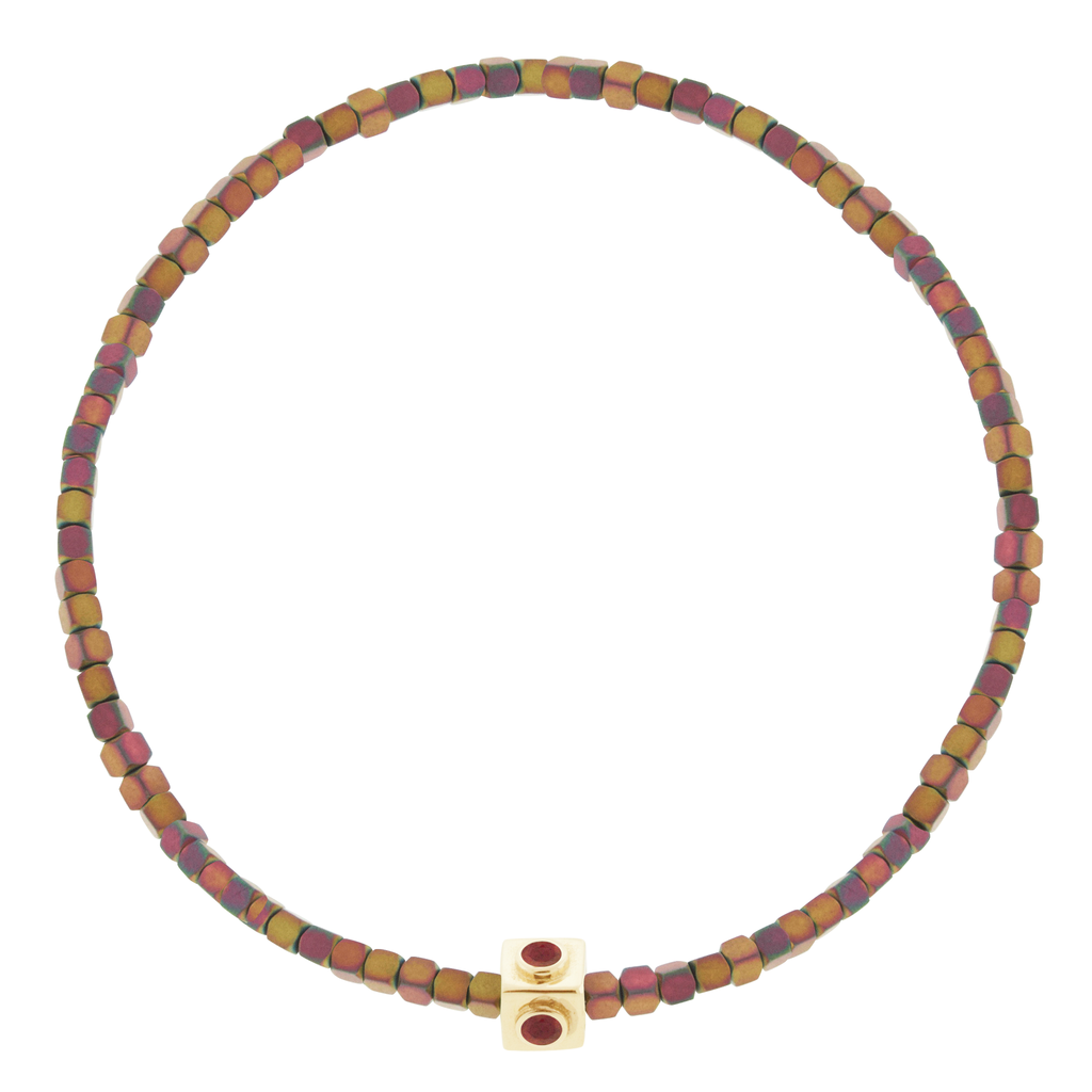 LUIS MORAIS 14k yellow gold Lego cube with four Ruby sides &nbsp;on a small Hematite beaded bracelet.