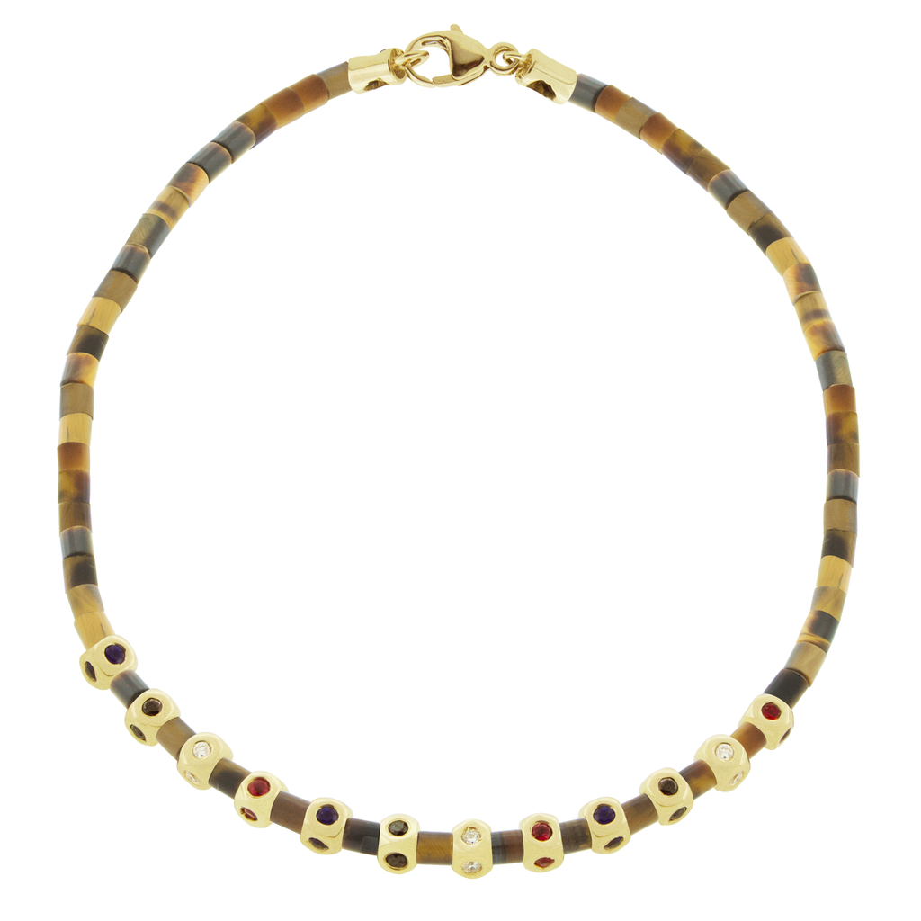 LUIS MORAIS 14k yellow gold mini Tetras with white diamonds, black diamonds, blue sapphires, and rubies on a gemstone beaded bracelet with a 14k yellow gold clasp.