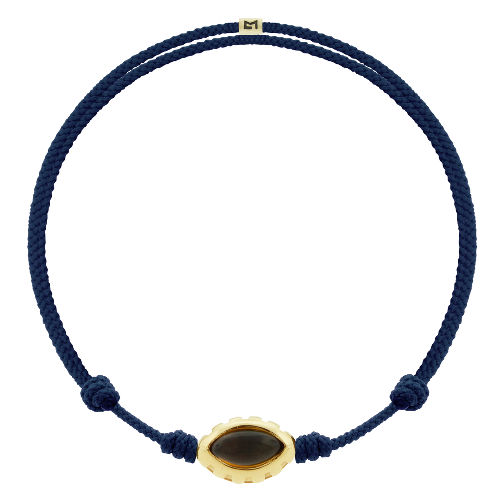 LUIS MORAIS 14k yellow gold Eye of the Idol bead with a marquise Citrine gemstone on a Navy cord bracelet.
