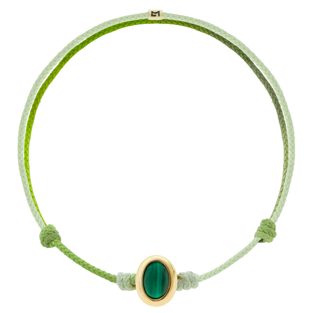 LUIS MORAIS 14k yellow oval cabochon <em>Eye of the Idol</em> bead with a Malachite gemstone center on an adjustable cord bracelet.