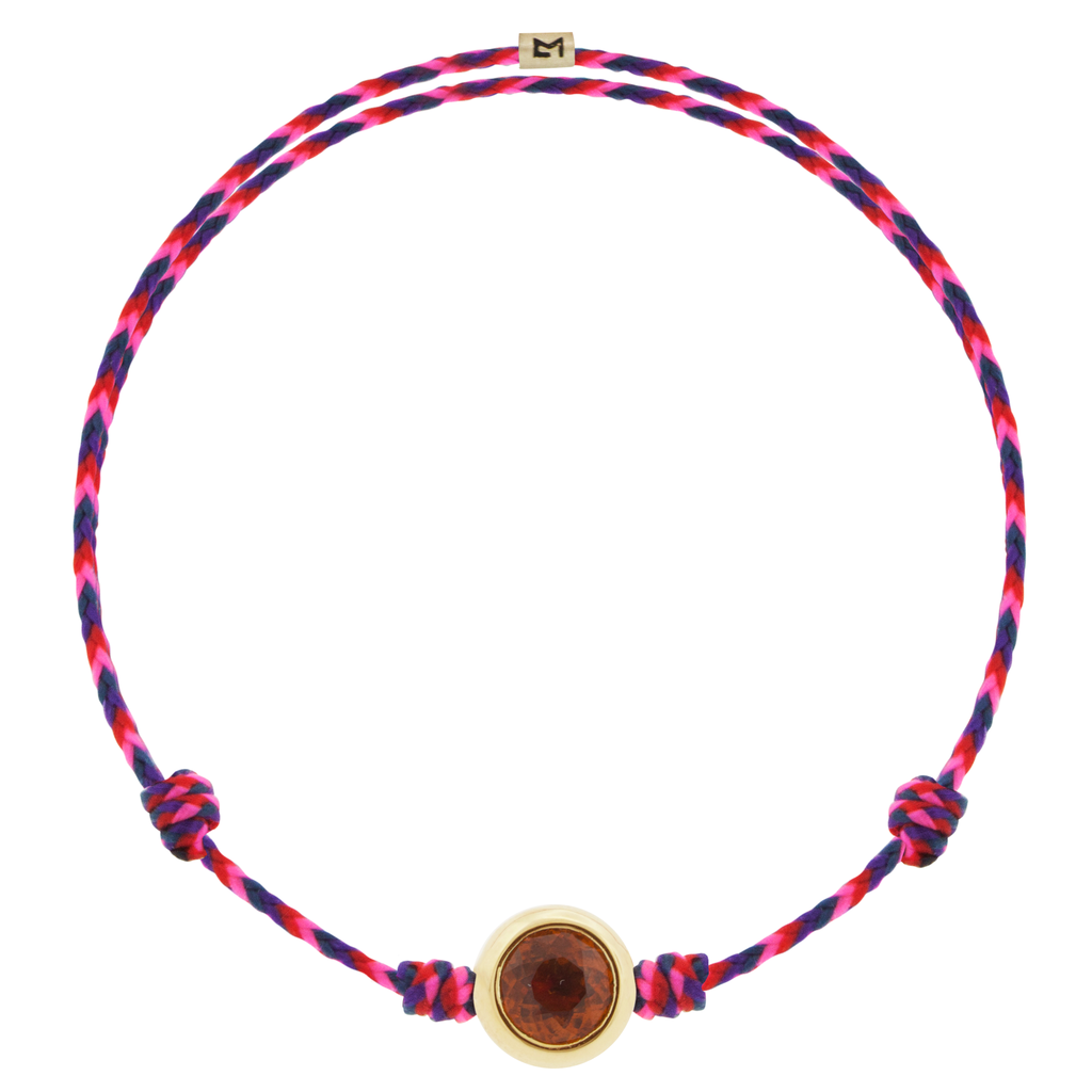 LUIS MORAIS 14k yellow round <em>Eye of the Idol</em> bead with an Orange Garnet gemstone center on an adjustable cord bracelet.