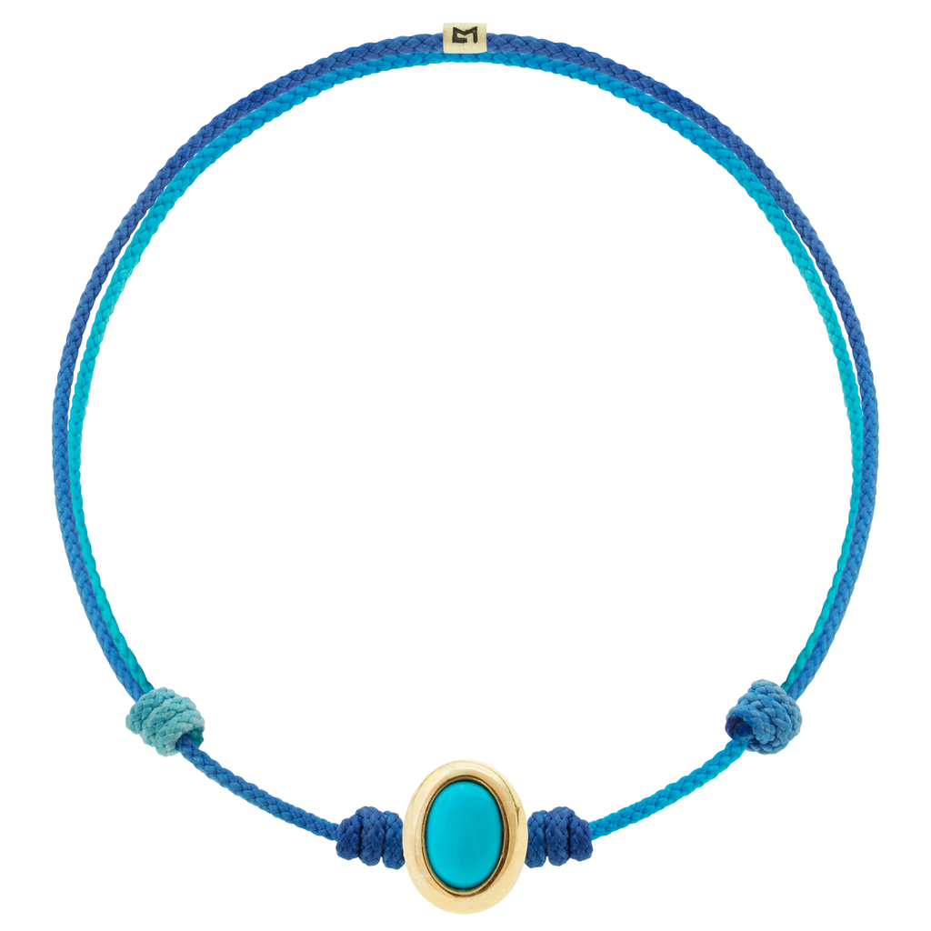 LUIS MORAIS 14k yellow oval cabochon <em>Eye of the Idol</em> bead with a Turquoise gemstone center on an adjustable cord bracelet.