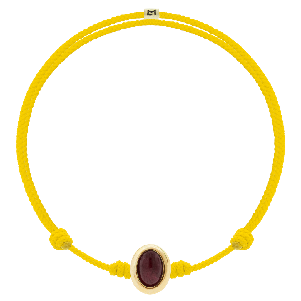 LUIS MORAIS 14k yellow oval cabochon <em>Eye of the Idol</em> bead with a Tiger's Eye gemstone center on an adjustable cord bracelet.