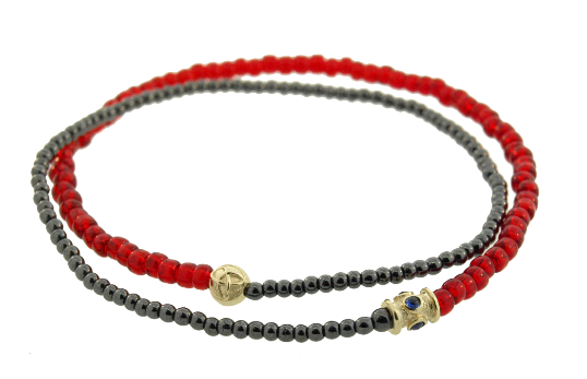 LUIS MORAIS double-wrap beaded bracelet features a 14k yellow gold barrel with blue sapphires and a round Torus knot gold bead.