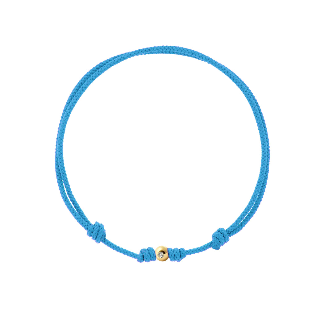 LUIS MORAIS small yellow gold ball with diamond on a sky blue cord bracelet