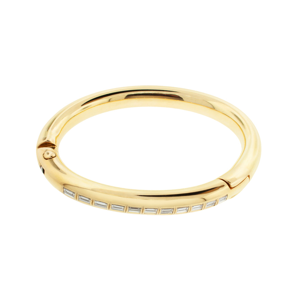 LUIS MORAIS 18K polished yellow gold Carabiner bangle bracelet with white diamond baguettes. Hinge closure.  Width: 8 mm 