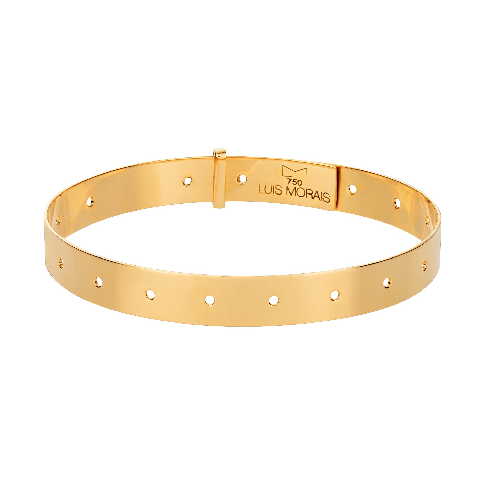 A simple 18k yellow gold ID cuff bracelet with a polished finish.