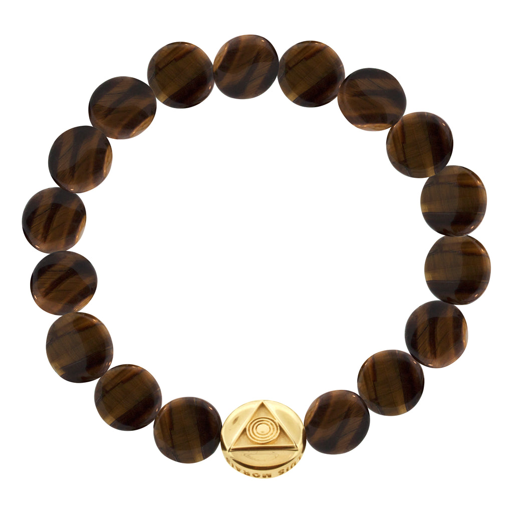 LUIS MORAIS 14K yellow gold large disk with the light of the majestic symbol on a large Tiger's Eye gemstone disk beaded bracelet. The light of the majestic represents the symbol where all life came from.