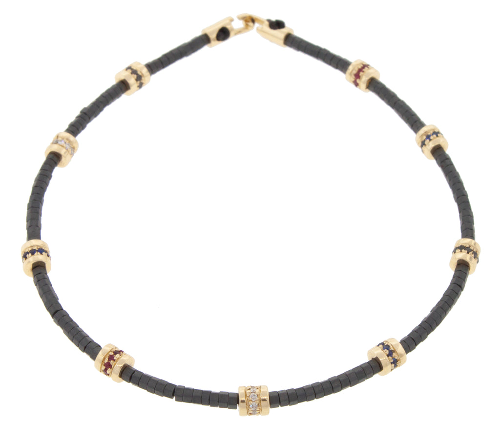 Nine Short Roll Beads with Diamonds and a Clasp on a Beaded Bracelet