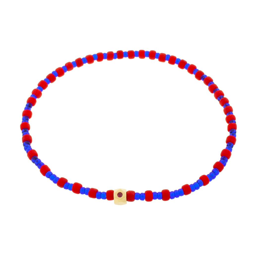 LUIS MORAIS 14K Yellow Gold Flat Tetra with a Ruby on a Red and Blue Glass Beaded Bracelet