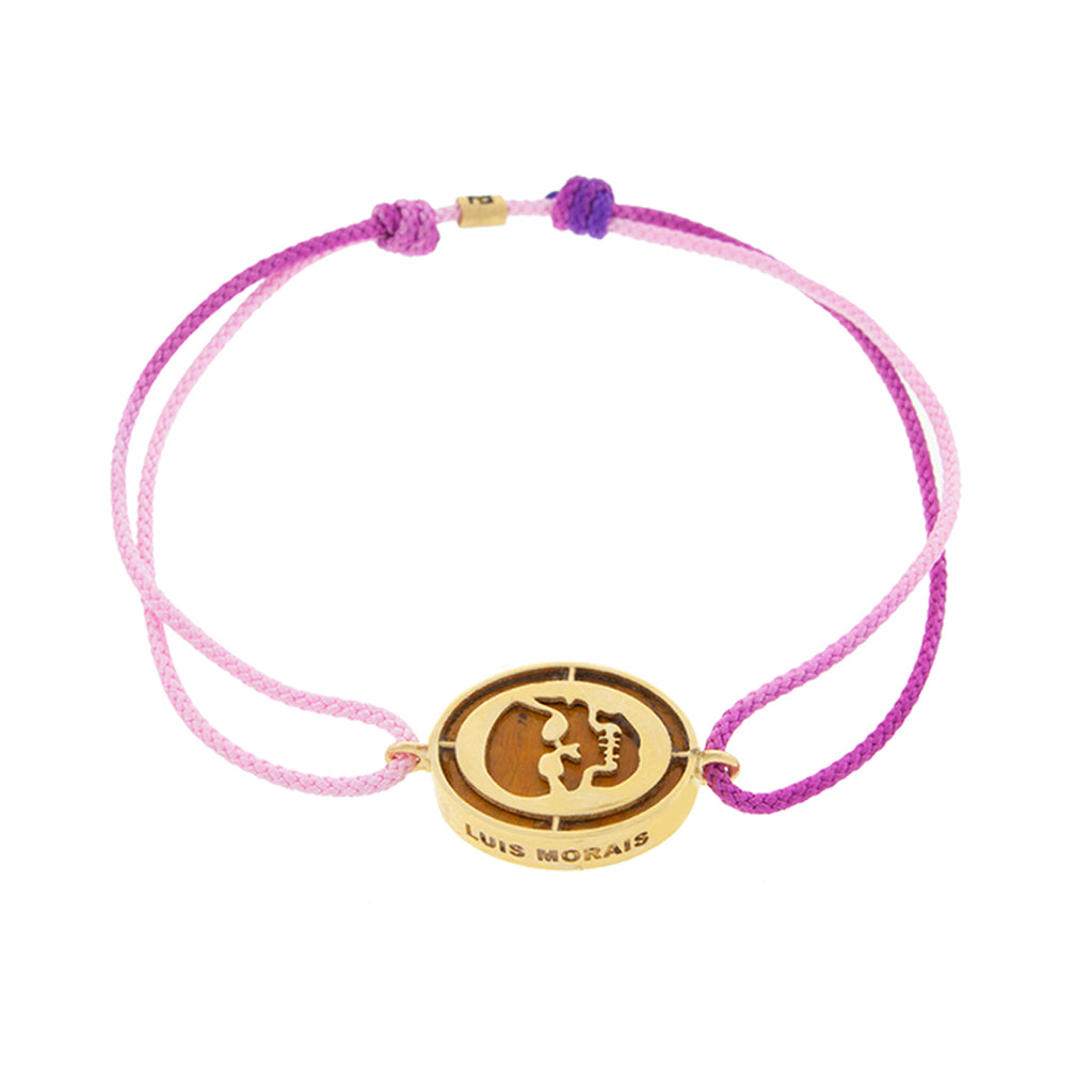 LUIS MORAIS 14K yellow gold 'The Good Times' skull medallion with a tiger's eye gemstone backing on a purple ombre cord bracelet