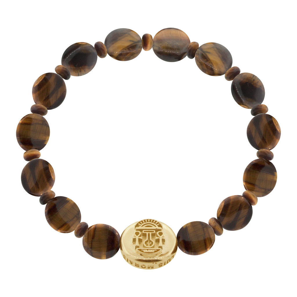 LUIS MORAIS 14K yellow gold large disk with a good luck symbol on a large tiger's eye disk and small round gemstone beaded bracelet. The symbol is on sides of the gold.