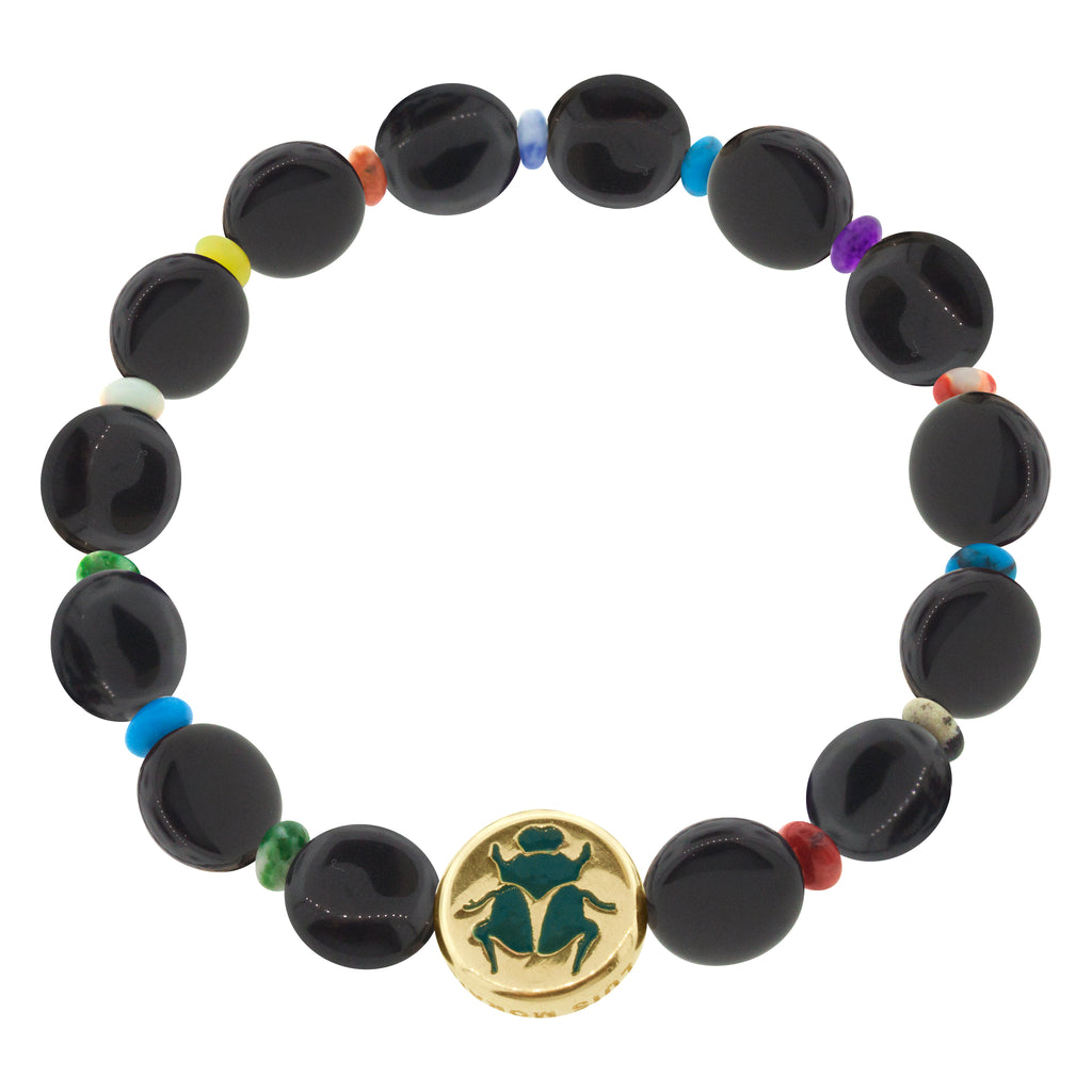 LUIS MORAIS 14K yellow gold large disk with an enameled scarab symbol  on a large onyx disks and small round multi gemstones on a beaded bracelet. The symbol is on both sides of the gold.