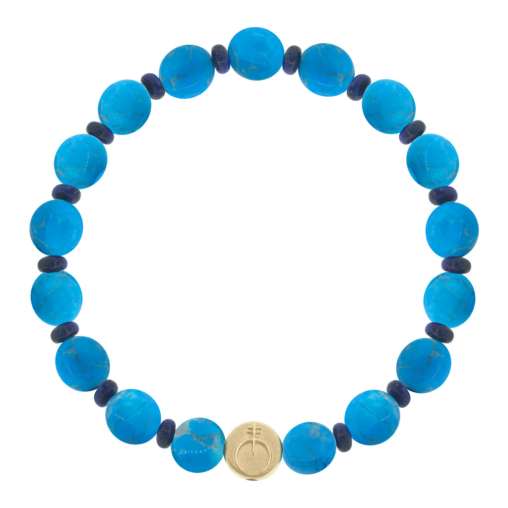 LUIS MORAIS 14K yellow gold small disk with a naja symbol on medium turquoise disks and lapis roundel beads on a beaded bracelet. The naja symbol is a symbol of protection. The symbol is on both sides of the gold.