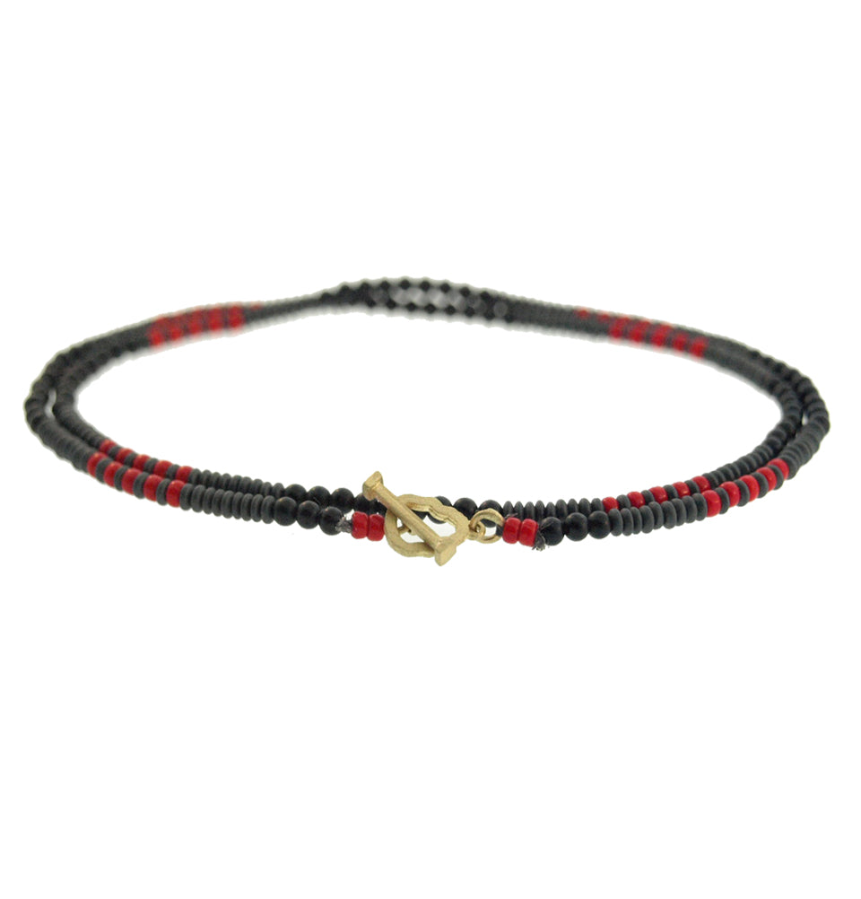 DOUBLE WRAP BEADED BRACELET WITH SKULL OUTLINE CLASP