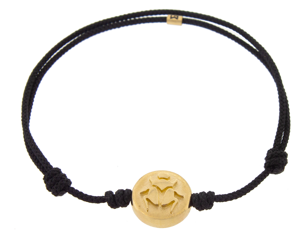 LUIS MORAIS 14K yellow gold large Scarab disk on a black cord bracelet. 