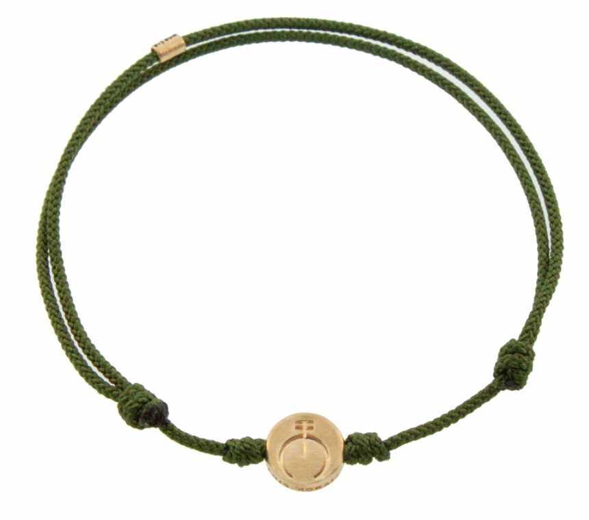 LUIS MORAIS 14K yellow gold small disk with a Naja symbol on a pine cord bracelet. The symbol is on both sides of the gold.
