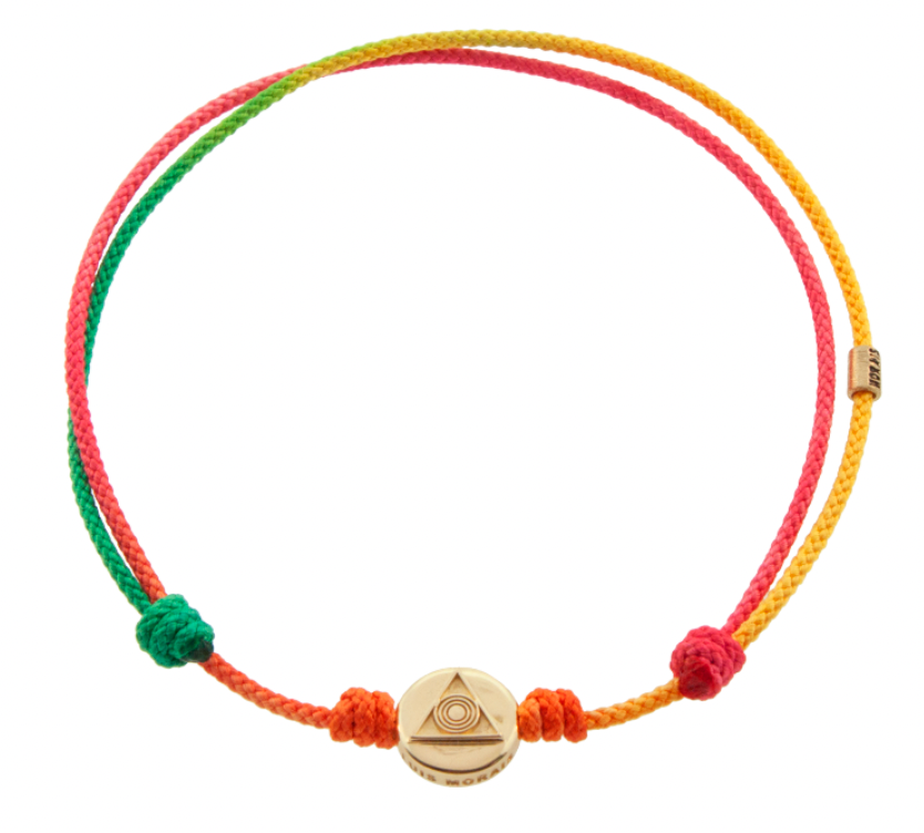 LUIS MORAIS 14K yellow gold small disk with the Light of the Majestic symbol on a rainbow ombre cord bracelet. The light of the majestic represents the symbol where all life came from. The symbol is on both sides of the gold.