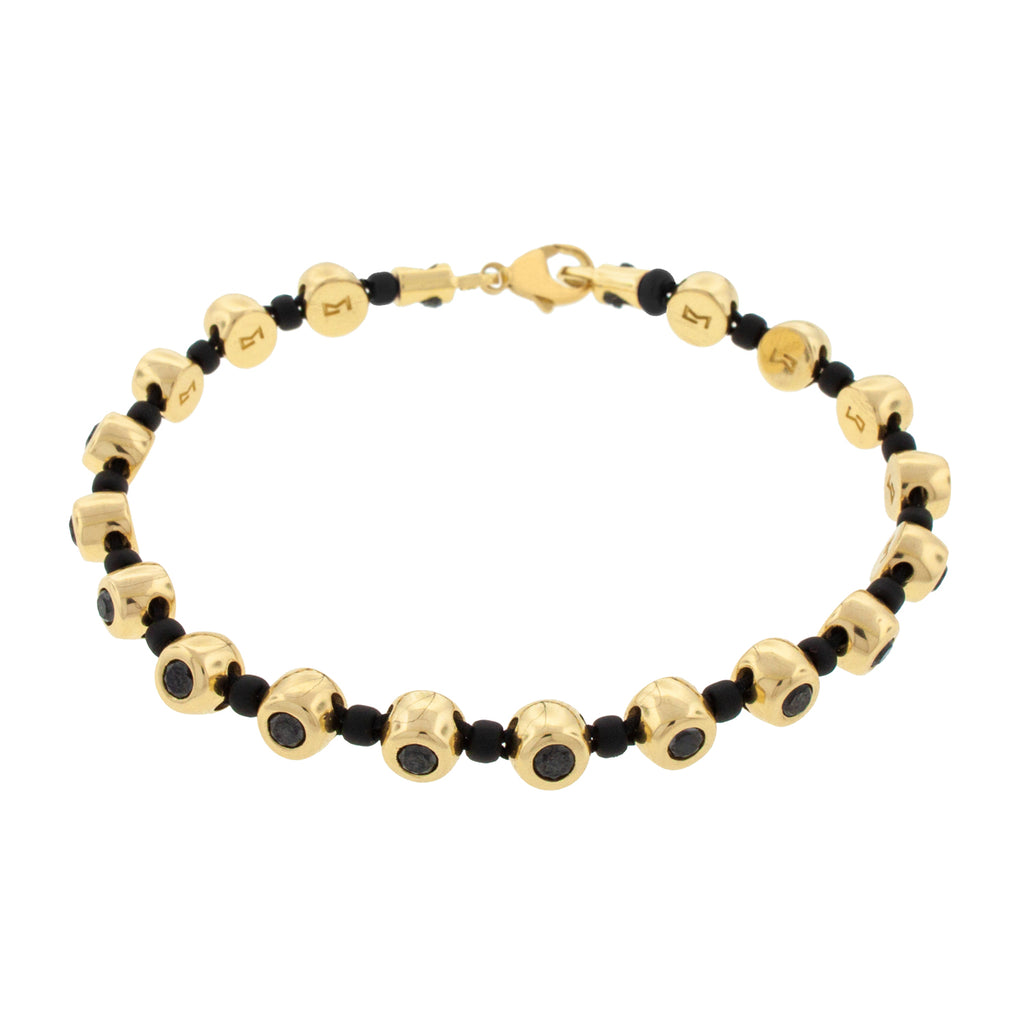 LUIS MORAIS 14K yellow gold and diamond dome bracelet with eighteen domes and approximately 2.7 CT of black diamonds. Each dome is separated by a multi color glass bead. The bracelet closes with our signature long clasp.