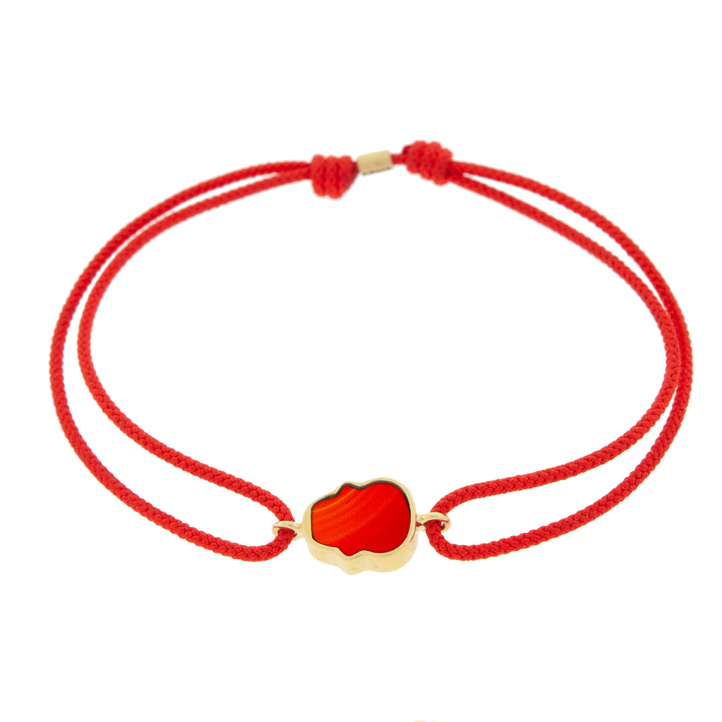 LUIS MORAIS 14K yellow gold 'The Good Times' small skull face medallion with a carnelian gemstone backing on a cherry cord bracelet back photo